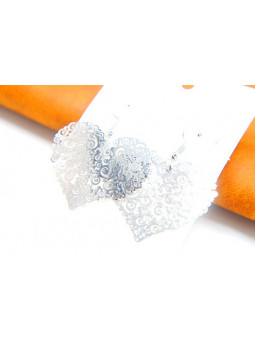 Boucles d'oreilles coeurs motifs argent 