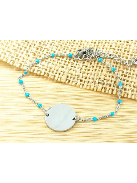 Bracelet Acier rondeur argent perles turquoises 