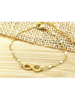 Bracelet Acier infini doré perles blanches 
