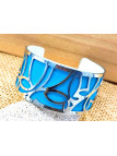 Bracelet papillons fond turquoise 