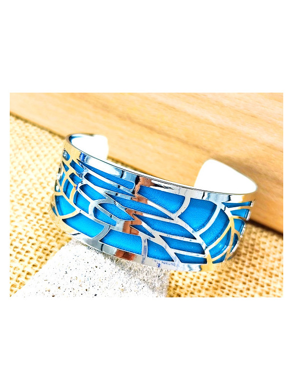 Bracelet métal ajouré fond turquoise 