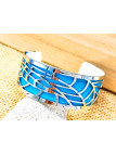 Bracelet métal ajouré fond turquoise 