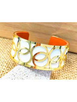 Bracelet blanc anneaux dorés 